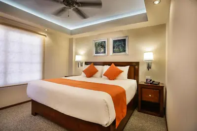 Cama o camas de una habitación en Royal Suite Cananea