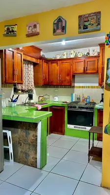 Una cocina o zona de cocina en Encantadora Cabaña de Campo con Alberca Privada