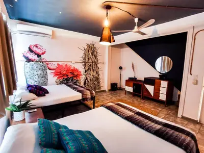 Cama o camas de una habitación en Hotel Casa los Abuelos