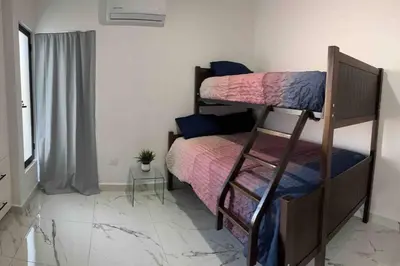 Cama o camas de una habitación en Miiv departamento Mazatlán