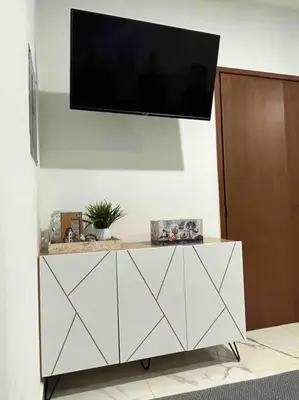 Una televisión o centro de entretenimiento en Miiv departamento Mazatlán