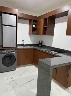 Una cocina o zona de cocina en Miiv departamento Mazatlán
