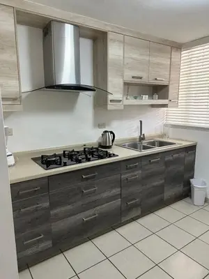 Una cocina o zona de cocina en Departamento cómodo e impecable