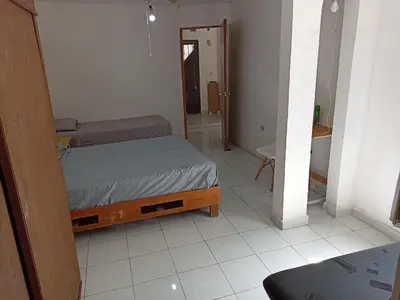 Cama o camas de una habitación en Casa Hotel Smart