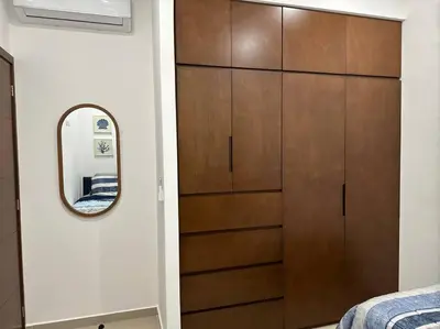 Cama o camas de una habitación en Cómodo departamento en Mazatlán