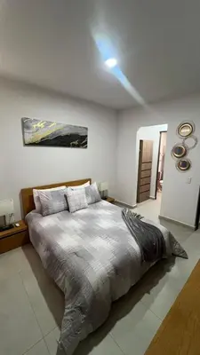 Cama o camas de una habitación en Blue Mazatlán