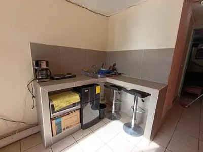 Una cocina o zona de cocina en Depa loft Los Ángeles 1