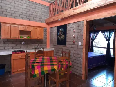 Una cocina o zona de cocina en Cabañas Los Cascabeles