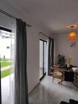 Zona de estar de Cómodo departamento vacacional con amenidades