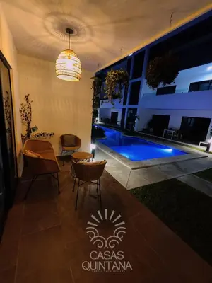 Piscina en o cerca de Cómodo departamento vacacional con amenidades