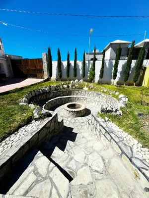 Jardín al aire libre en Amplia casa en Parras con wifi, fogatero y asador