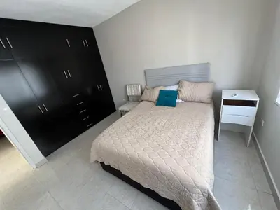 Cama o camas de una habitación en Alojamiento residencial, cerca de TSM