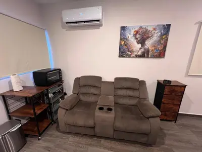 Una televisión o centro de entretenimiento en 1 Minuto a la Playa en Mazatlan