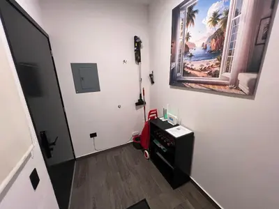 Una televisión o centro de entretenimiento en 1 Minuto a la Playa en Mazatlan