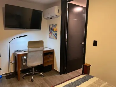 Una televisión o centro de entretenimiento en 1 Minuto a la Playa en Mazatlan