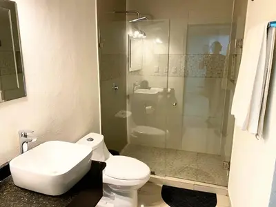 Un baño de Condominio Portico