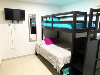 Cama o camas de una habitación en Condominio Portico