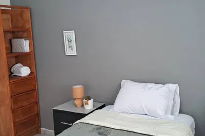 Cama o camas de una habitación en Alojamiento cómodo en Lomas de San Isidro