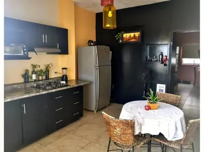 Una cocina o zona de cocina en Depa Terraza San Isidro