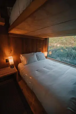 Cama o camas de una habitación en Wander Cabins Artega