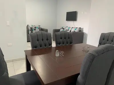 Una televisión o centro de entretenimiento en Departamento Completo Céntrico Ideal Para 3