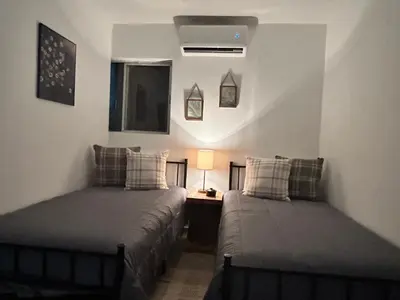 Cama o camas de una habitación en Cómodo Estudio en la Kennedy cerca de Consulado