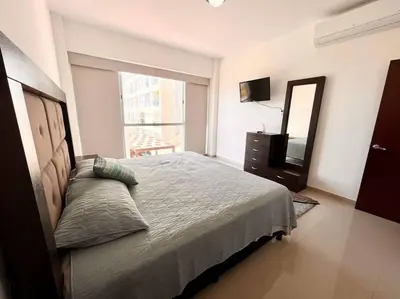 Cama o camas de una habitación en SERENA Departamento en Marina Platino