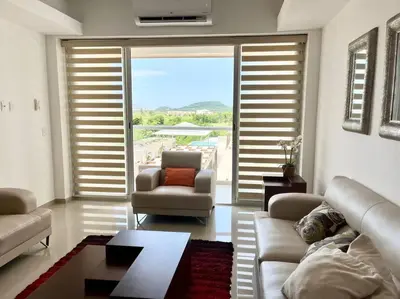 Zona de estar de SERENA Departamento en Marina Platino