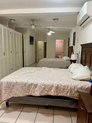 Cama o camas de una habitación en La Casa de Angelita