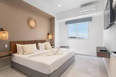 Cama o camas de una habitación en Vista Hermosa en Depa Lujoso Punta Bahia