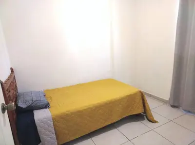 Cama o camas de una habitación en Excelente casa cómoda