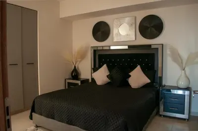 Cama o camas de una habitación en Malecón Love