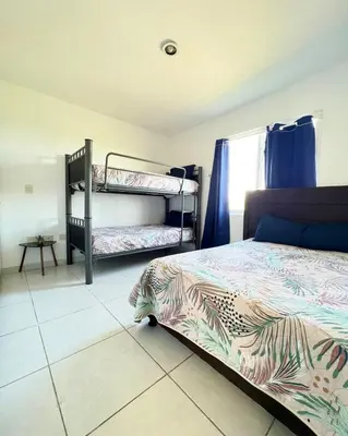Cama o camas de una habitación en Alejandría Depto Moderno - Café Luxury - 3 Min Malecón y Playas