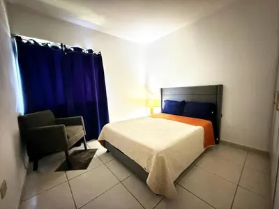 Cama o camas de una habitación en Alejandría Depto Moderno - Café Luxury - 3 Min Malecón y Playas