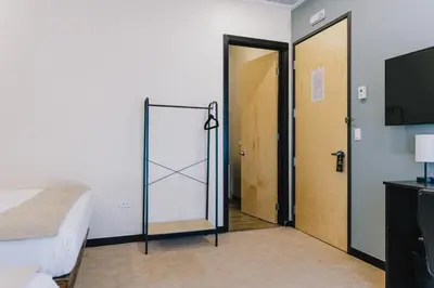 Cama o camas de una habitación en Hospedaje Consular by Dunas