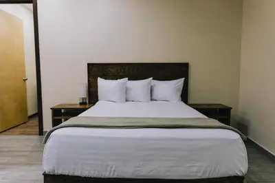 Cama o camas de una habitación en Hospedaje Consular by Dunas