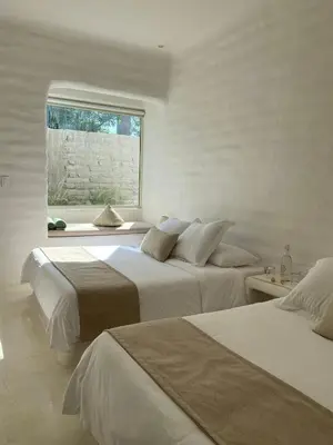 Cama o camas de una habitación en Casa Atha boutique