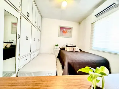 Cama o camas de una habitación en Departamento 2 Habitaciones Cas Consulado Centenario