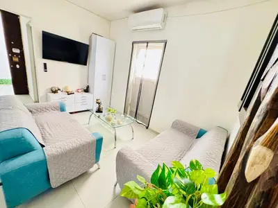 Una televisión o centro de entretenimiento en Departamento 2 Habitaciones Cas Consulado Centenario