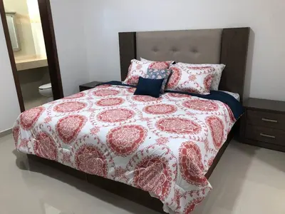 Cama o camas de una habitación en Dpto de 2 recamaras con alberca excelente ubicacion