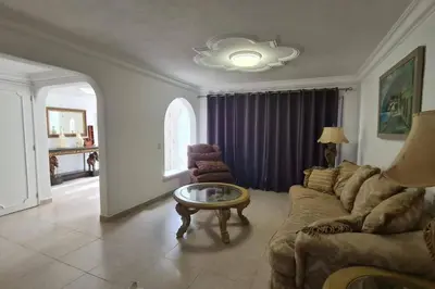 Zona de estar de Casa 16 personas 7 cuadras playa