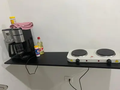 Una cocina o zona de cocina en Departamento privado con piscina