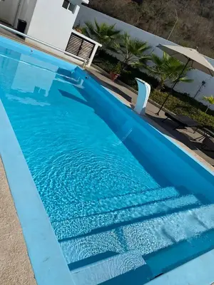 Piscina en o cerca de Departamento privado con piscina