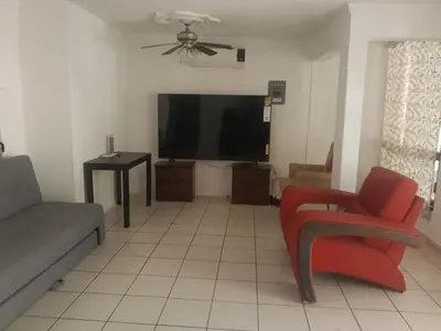 Zona de estar de an excellent location