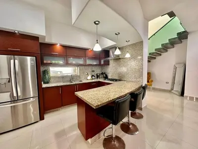 Una cocina o zona de cocina en Tú Casa de playa Playa Brujas Residence & Beach club
