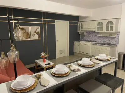 Una cocina o zona de cocina en Cómodo y agradable departamento con estacionamiento y portón eléctrico