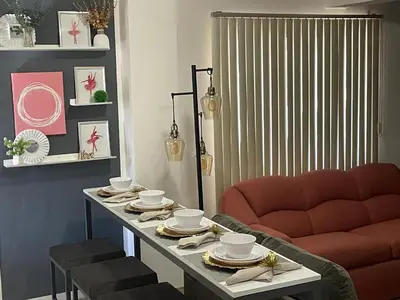 Zona de estar de Cómodo y agradable departamento con estacionamiento y portón eléctrico