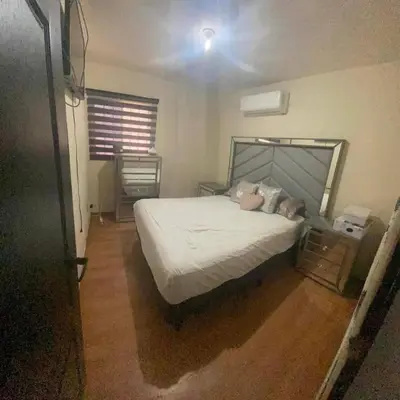 Cama o camas de una habitación en Cuarto en renta