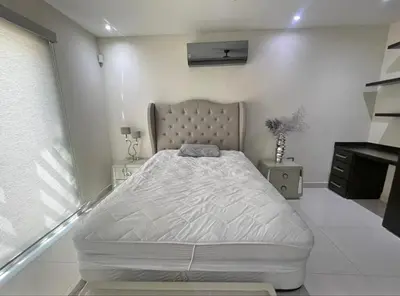 Cama o camas de una habitación en Cuarto en renta