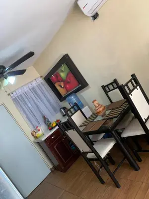 Una televisión o centro de entretenimiento en Casa de estar